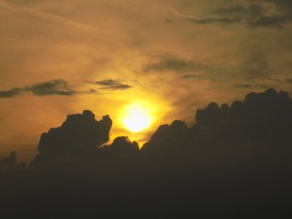 Sunset over convective clouds