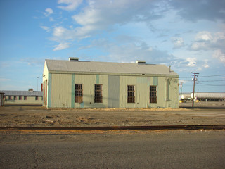 Fototapeta na wymiar old industrial building with blue sky