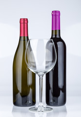 Three wine bottles isolated on white background