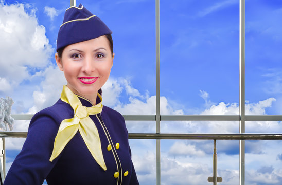 Portrait of smiling stewardess at the airport