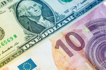 Fototapeta na wymiar U.S. one dollar bill and ten euro
