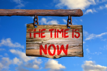 Fototapeta premium The time is now motivational phrase sign