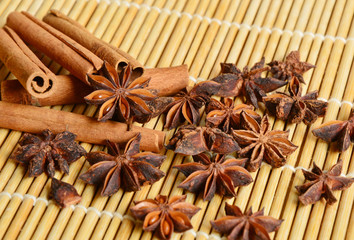 cinnamon with bamboo placemats background  (soft focus,lens blur)