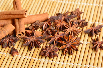 cinnamon with bamboo placemats background  (soft focus,lens blur)