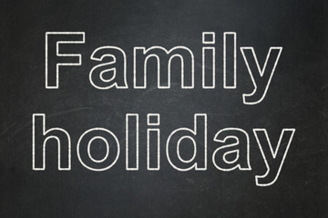 Tourism concept: Family Holiday on chalkboard background