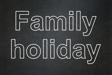Fototapeta premium Tourism concept: Family Holiday on chalkboard background