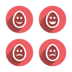 Eggs happy and sad faces signs. Easter icons.