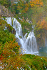 Fototapeta na wymiar Waterfall the Plitvice Lakes in autumn