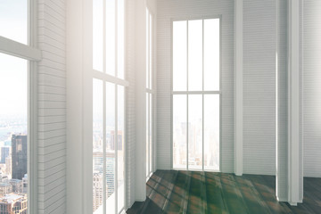 Fototapeta na wymiar Modern sunny loft design room with broun wood floor and city vie
