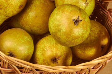 Wicker basket with pears.