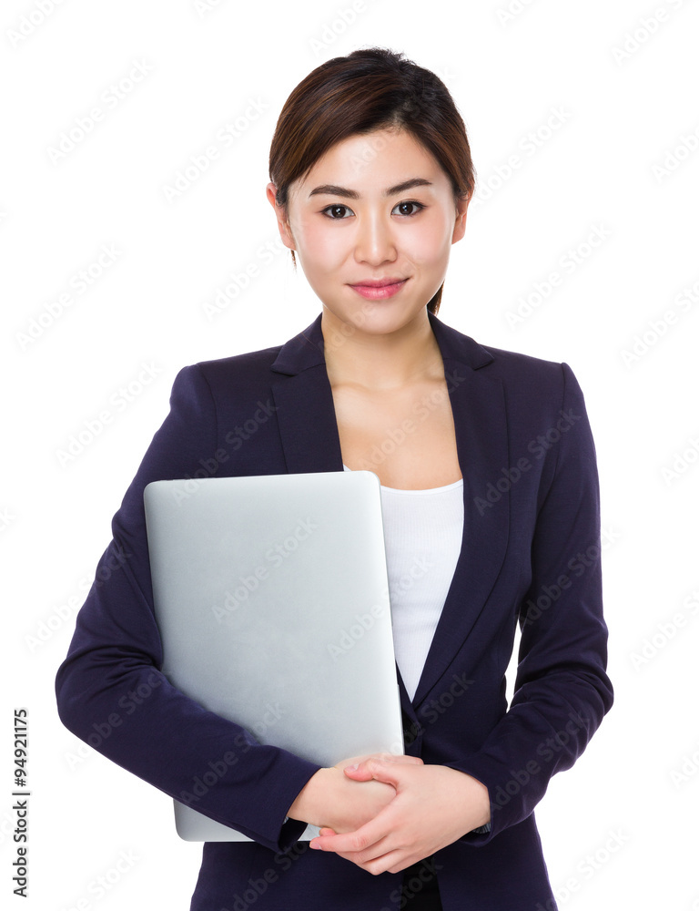 Wall mural Asian Businesswoman hold with laptop computer