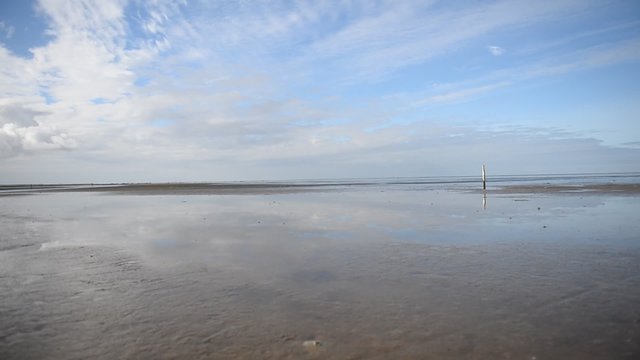 Spiegelung im Wattenmeer