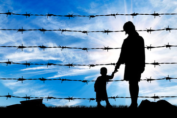  Silhouette of hungry refugees mother and child