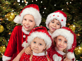 Fototapeta na wymiar Group of funny christmas children