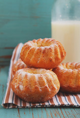 homemade cake with a bottle of milk