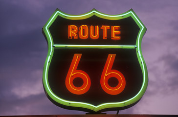 A neon sign reading Route 66 in Barstow, California