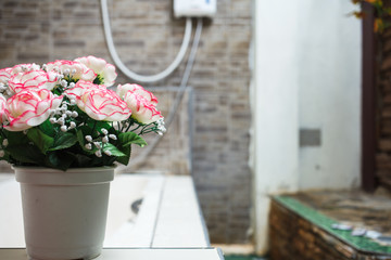 Fototapeta na wymiar rose flower pot