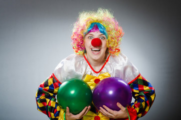 Funny clown in comical concept