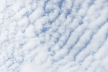 white fluffy clouds in the blue sky