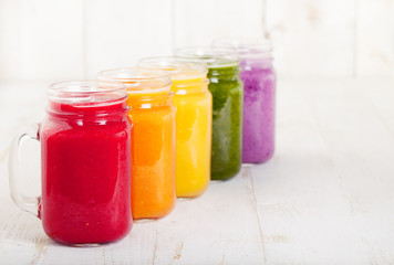 Smoothies, juices, beverages, drinks variety with fresh fruits and berries .