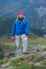 Obraz premium advanture man with backpack hiking