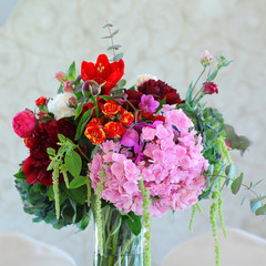 Serving on the table restaurant catering elegant floral arrangement wedding tent White canopy