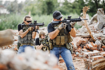 Private Military Contractor on patrol in destroyed city