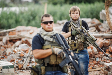 Private Military Contractor on patrol in destroyed city