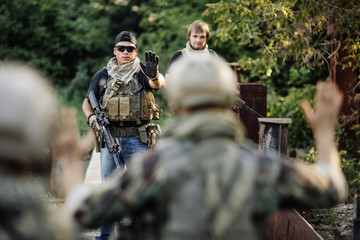 Private Military Contractor inspect the documents on blocked