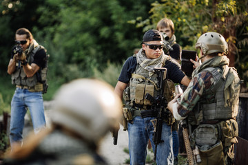 Private Military Contractor inspect the documents on blocked