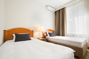 Interior of a hotel bedroom in the morning - sunlight