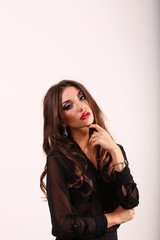 Fototapeta premium Woman with beauty long brown hair - posing at studio