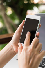 Business hand with mobile phone