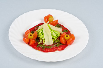 Meat carpaccio at plate