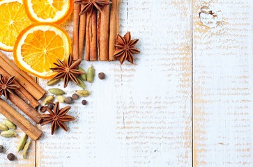 spices for mulled wine on a white wooden background. Christmas, New Year background.