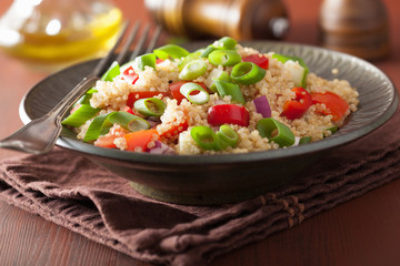 healthy quinoa salad with tomato cucumber onion chives