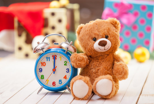 Alarm clock and teddy bear