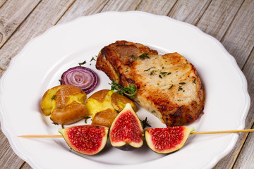 Grilled Pork Chop with Figs on Scewer, Crisp Roasted Potatoes and Thyme