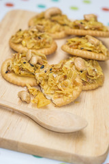 cracker with backed durian and black sesame