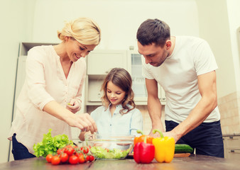 happy family making dinner in kitchen