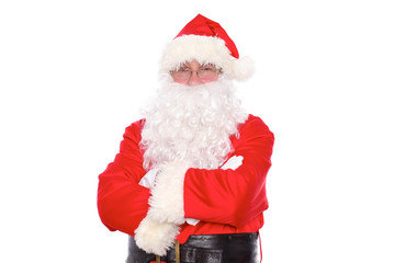 Kind Santa Claus standing with crossed arms, isolated on white background