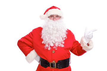 Kind Santa Claus pointing in white blank sign, isolated on white background
