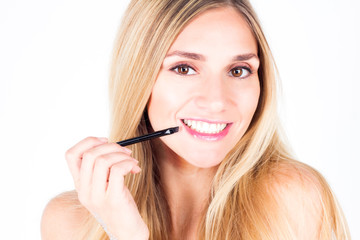 beautiful woman with smile with teeth and lips brush