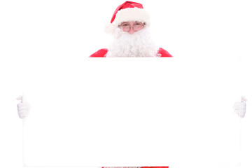 Kind Santa Claus holding copy space area, isolated on white background
