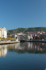Fototapeta na wymiar Spain, Bilbao, Nervion's river, city hall building