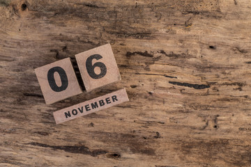 wooden calendar for november on wooden surface