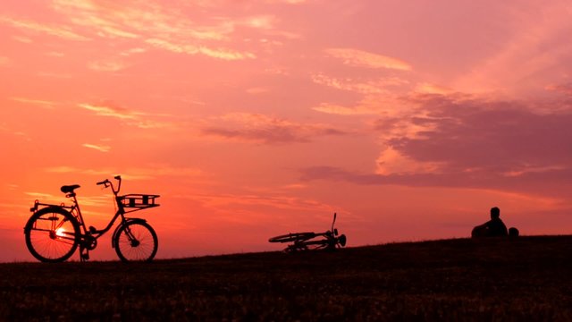 sky sunset  landscape sea bicycle people