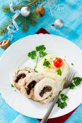 Chicken roll with prunes and nuts in a New Year's Eve