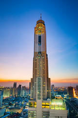 Fototapeta na wymiar Baiyok II tower and surroundings buildings at twilight Bangkok,