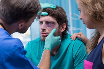Doctor examining patient